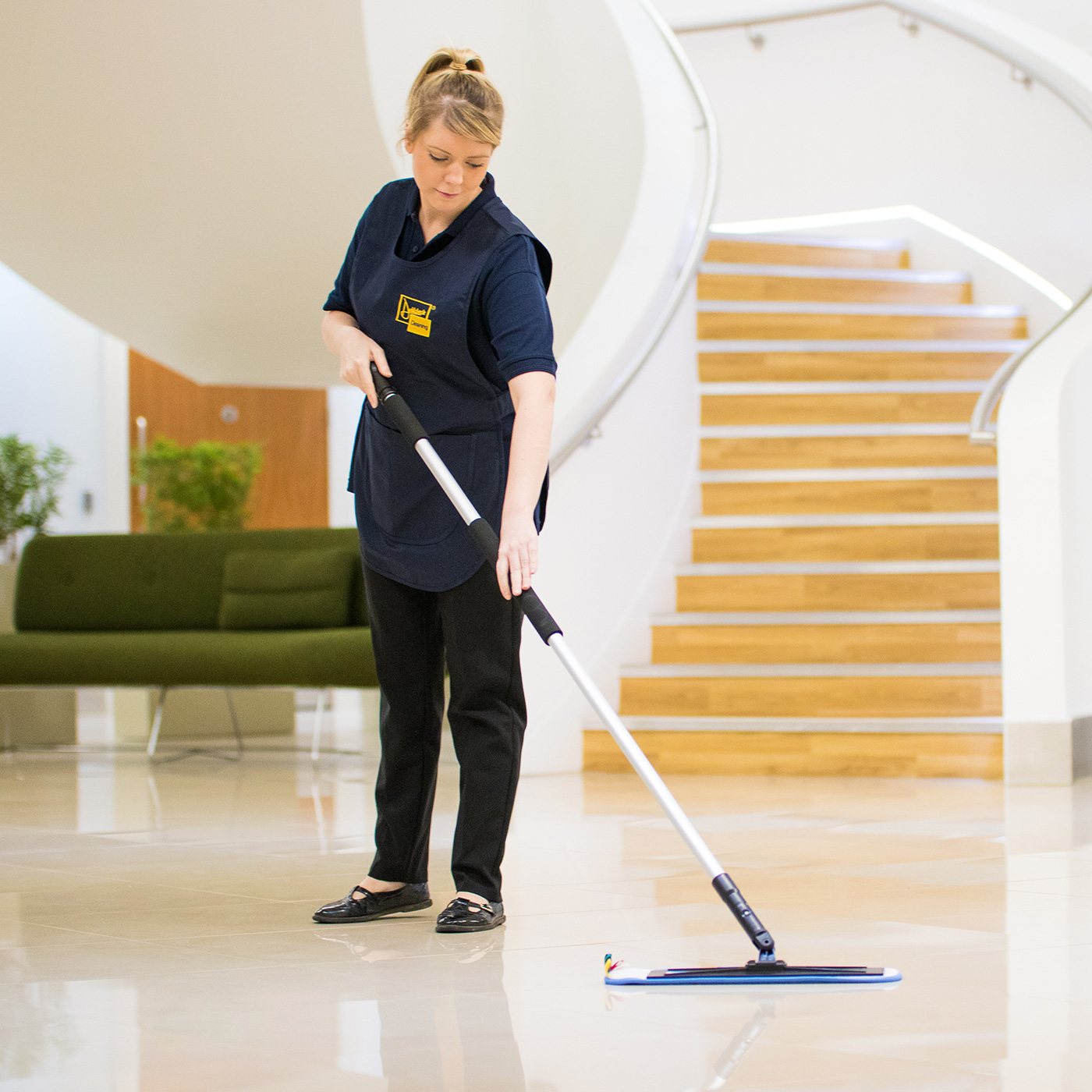 cleaner moping office floor